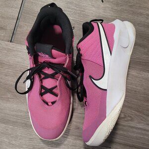 Youth pink Nike Hustles